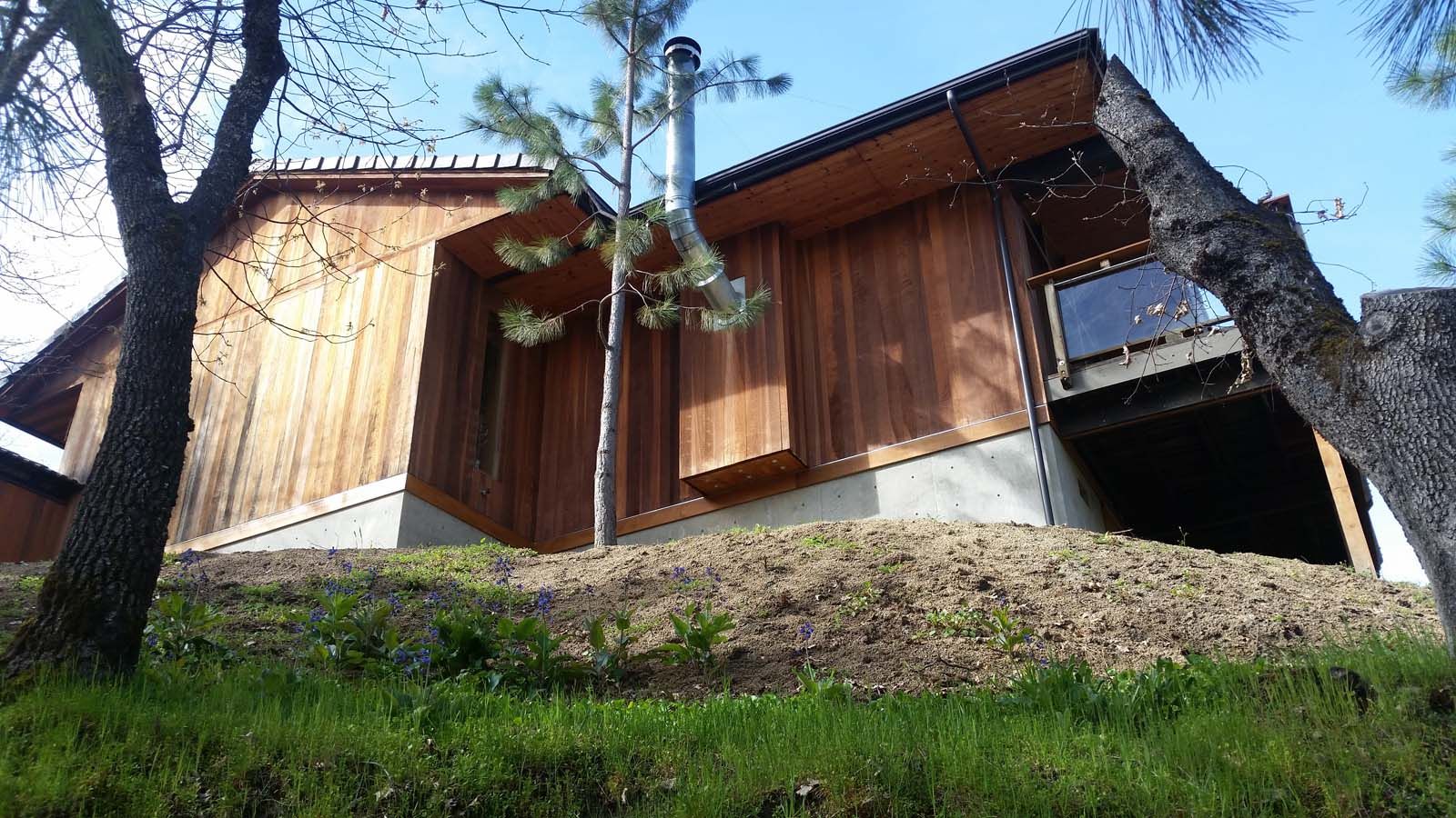 custom home remodel with wood siding