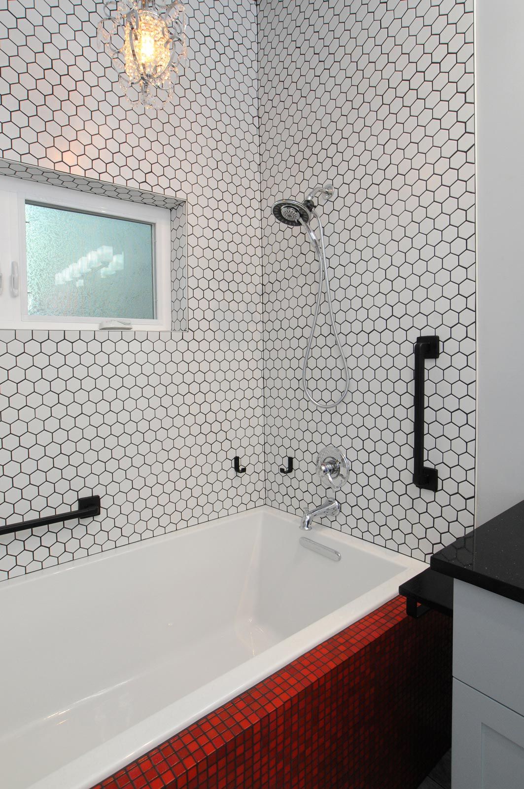 remodeled bathroom tiled shower and tub