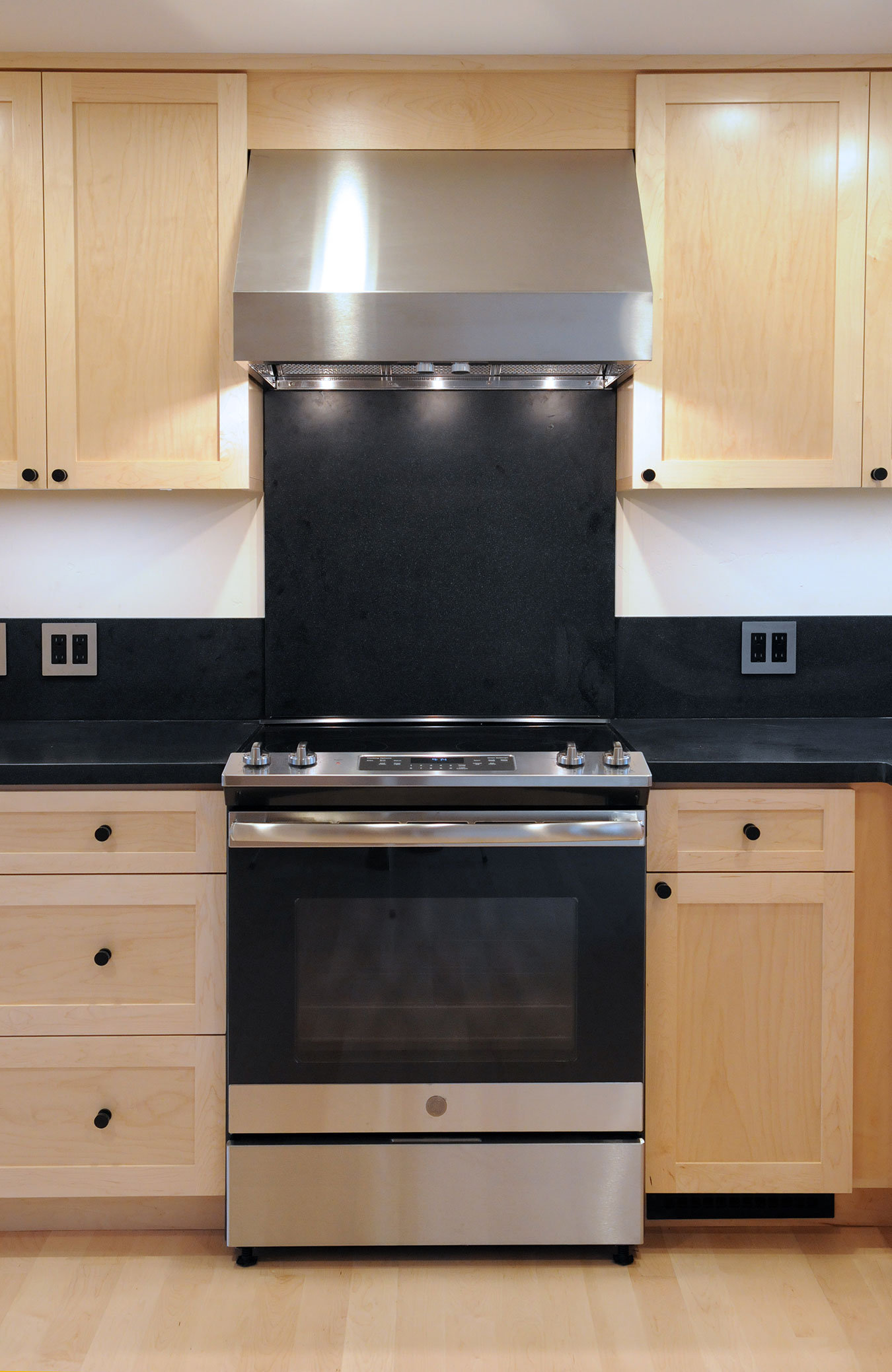 custom kitchen design wood cabinets and black granite counters